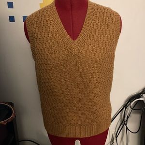 Brown knit sweater vest.